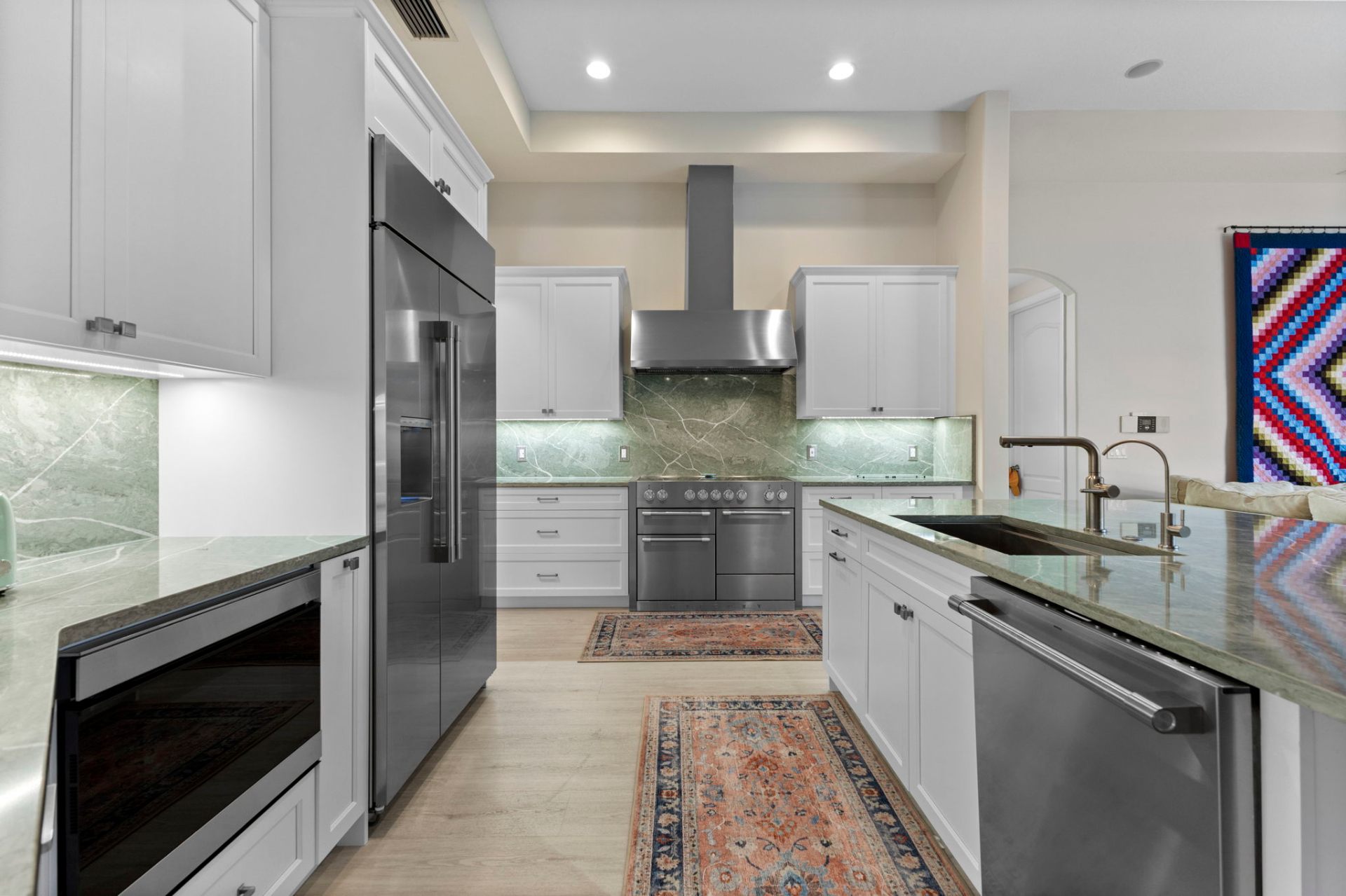 Murphy Project Greenbrook kitchen design with green stone backsplash