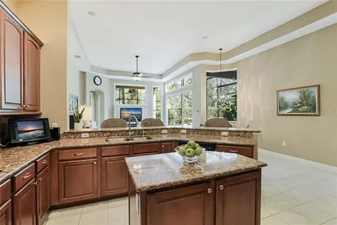 Before — original island and breakfast bar configuration